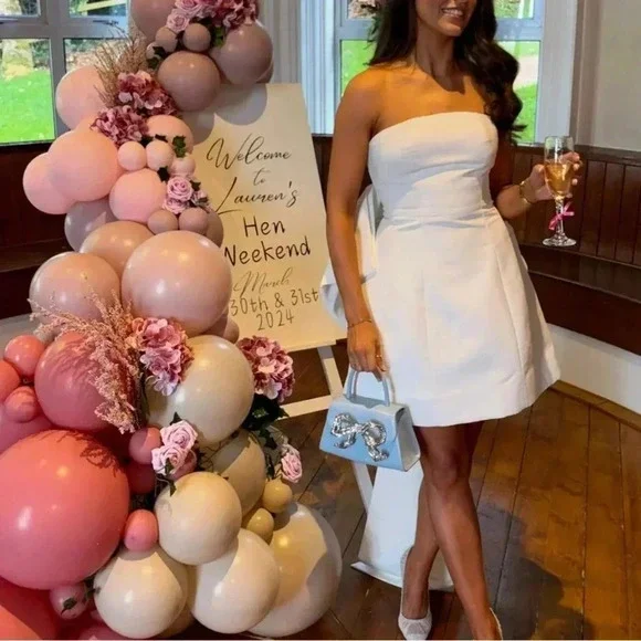 sachin & babi grace strapless back bow mini dress Ramona Sequin Silk Faille Straight strapless neckline Seam at natural waist Oversized bow back Concealed back zipper with hook and eye closure Fully lined Shell New Sachin & Babi Grace